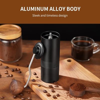 黒い12のセットの密集したコーヒー豆挽器二重軸受けは円錐ぎざぎざの粉砕機のクランクを手で回す